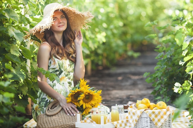 Attractive woman with lemons.