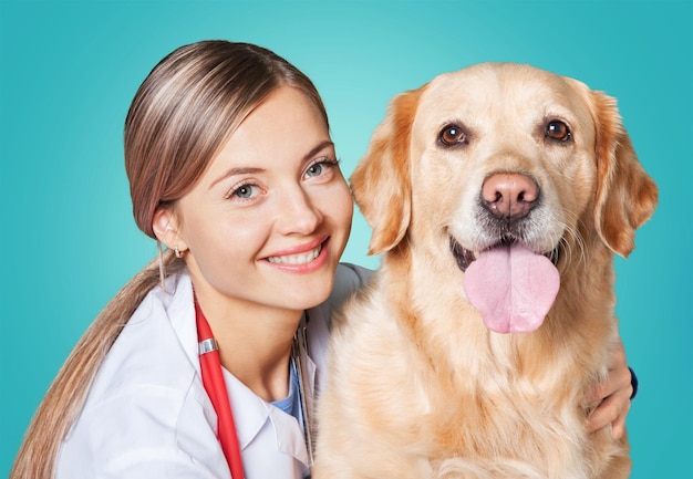 Attractive young female doctor with funny dog patient