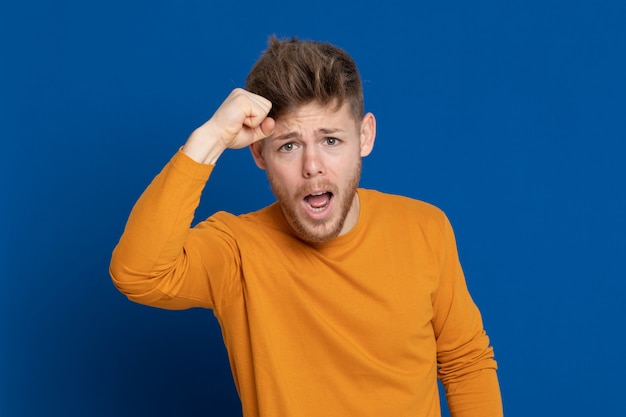 Attractive young guy with a yellow T-shirt