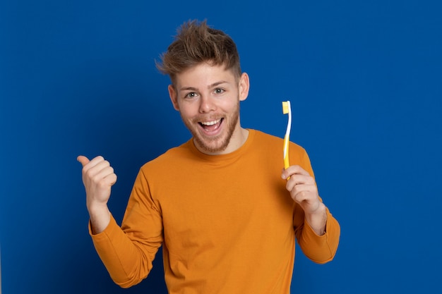 Attractive young guy with a yellow T-shirt