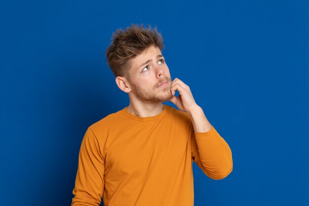 Attractive young guy with a yellow T-shirt