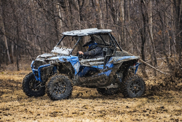 ATV adventure. Buggy extreme ride on dirt track. UTV