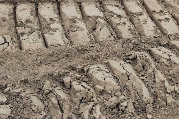 Photo atv tire tracks side by side in the dirt