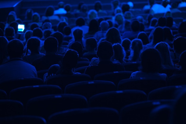 Audience in the cinema silhouette