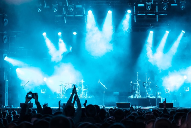 Audience crowd people raise hands enjoy live music festival concert event