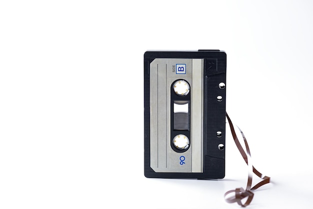 Audio cassette for a tape recorder on a white background