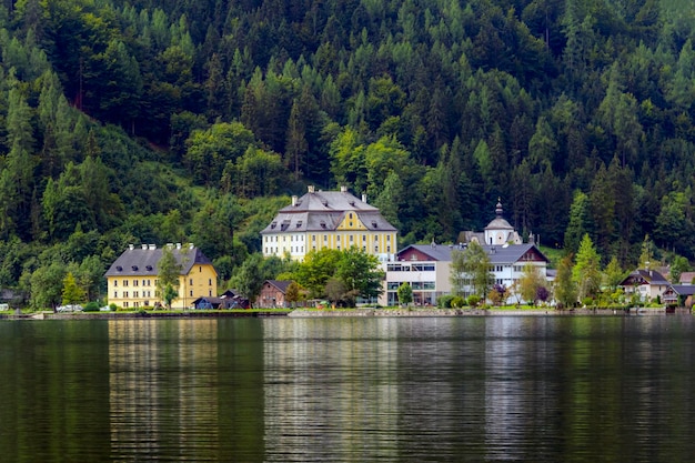 Photo austria church house nature water lake landscape mountain town scenery reflection dawn m