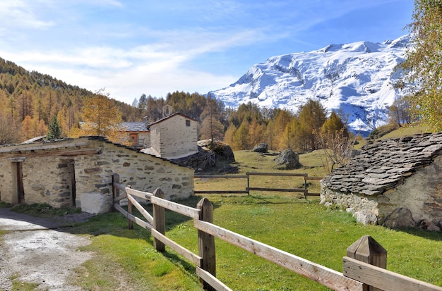 Authentic and ancient french alpine village in mountain landscape