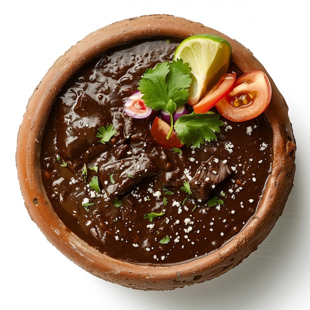 Authentic Mexican Mole Sauce with Chicken Garnished with Fresh Lime and Tomato