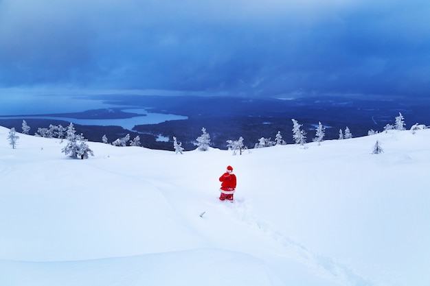 Authentic Santa Claus on a snowy mountain. 