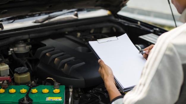 auto mechanic car engine check according to the repair checklist, Service and maintenance of cars.