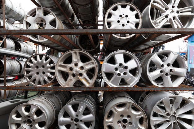 Auto parts market. Car wheels are on the ground.