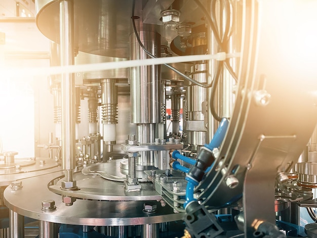 Automatic bottlemaking machine working in the factory