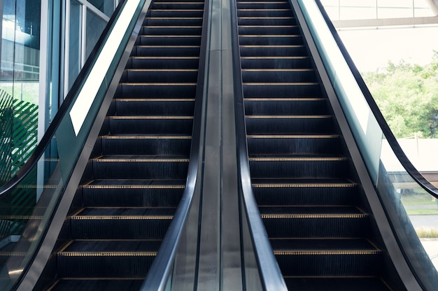 Automatic electric escalators with railing moving up and down