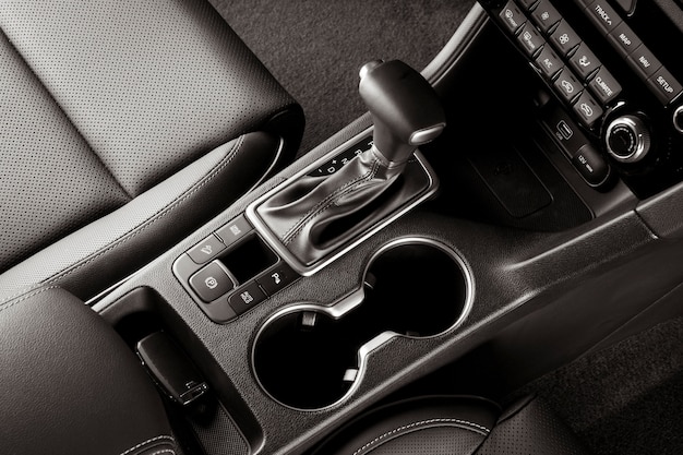 Automatic gear lever inside a new car, top view