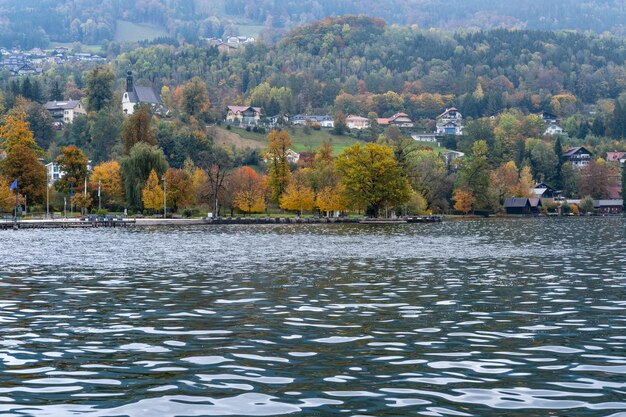 Autumn Alps mountain lake Mondsee view Salzkammergut Upper Austria People unrecognizable