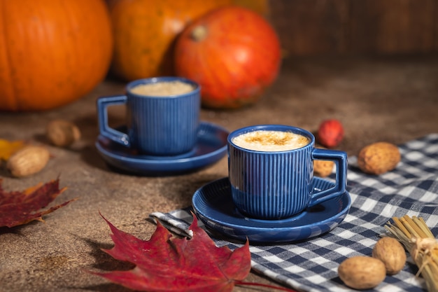 Autumn coffee still life, coffee in blue cups