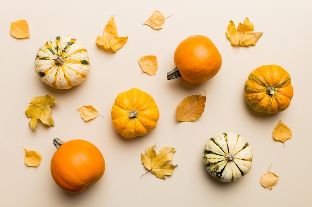 Autumn composition Pattern made of dried leaves and other design accessories on table Flat lay top view