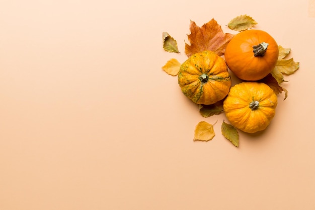 Autumn composition Pattern made of dried leaves and other design accessories on table Flat lay top view