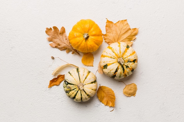 Autumn composition Pattern made of dried leaves and other design accessories on table Flat lay top view