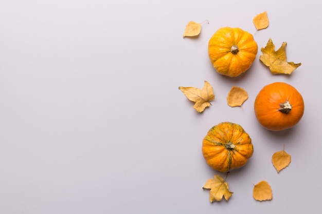 Autumn composition Pattern made of dried leaves and other design accessories on table Flat lay top view