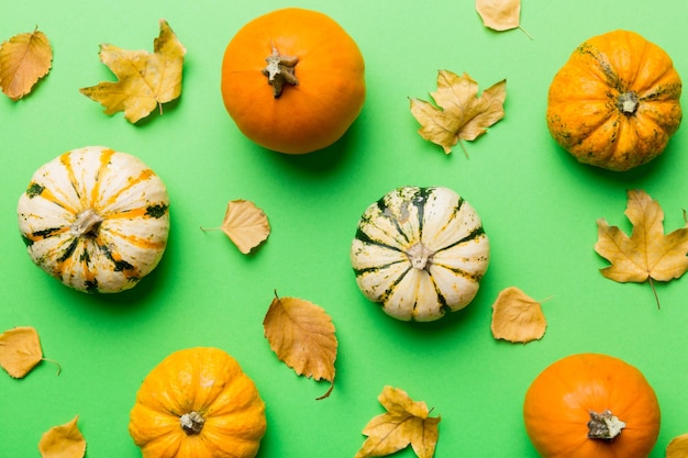 Autumn composition Pattern made of dried leaves and other design accessories on table Flat lay top view