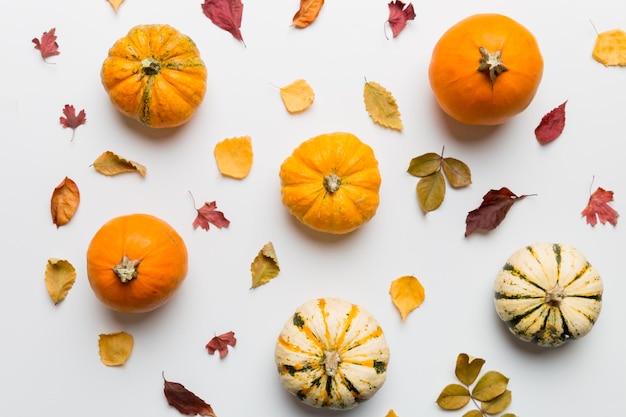 Autumn composition Pattern made of dried leaves and other design accessories on table Flat lay top view