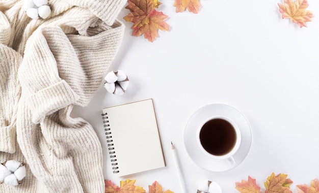 Autumn composition with cotton flowers and dry leaves