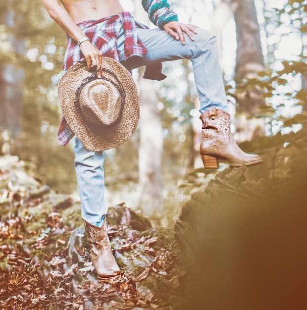 Autumn cowboy style Fashion girl outdoors