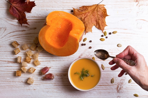 Autumn delicious and healthy pumpkin soup cream