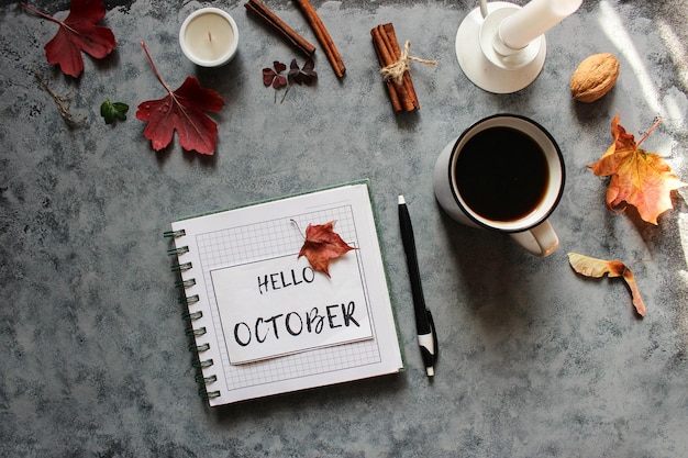 Autumn flat lay with small pumpkins fall maple leaves and blank paper notebook on a white background The concept of september and school mockup