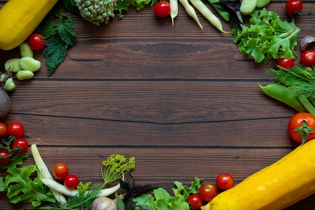 Autumn fresh vegetables on wooden table background