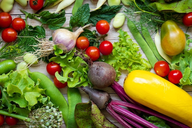 Autumn fresh vegetables on wooden table background