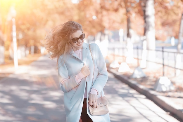 autumn girl / portrait of a girl in an autumn city park, walk happy weekend female portrait