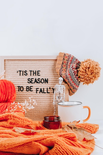 Autumn inscription on letterboard This the season to be fally Hygge autumn cozy mood comfort concept