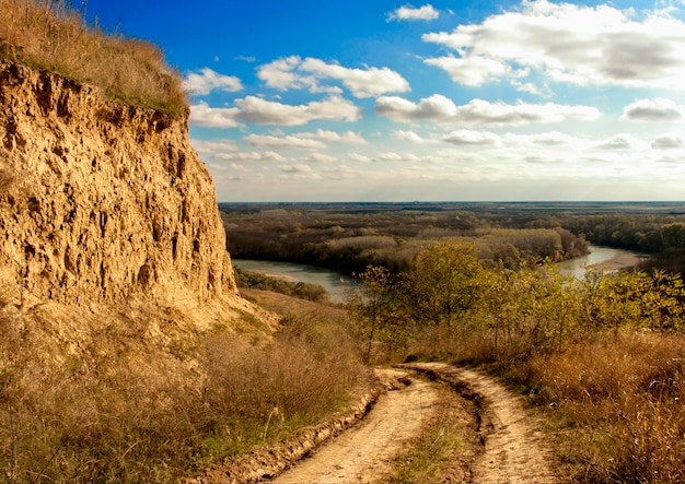 Autumn landscape with blue sky and clouds