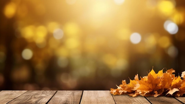 Autumn leaves on a wooden table with a golden background photo