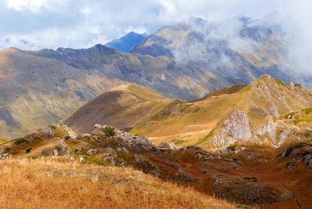 Autumn mountain landscape of the Caucasus with rocky alpine meadows