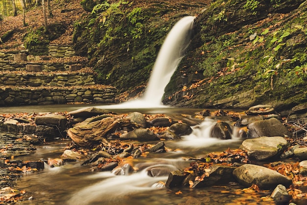 Autumn mountain waterfall