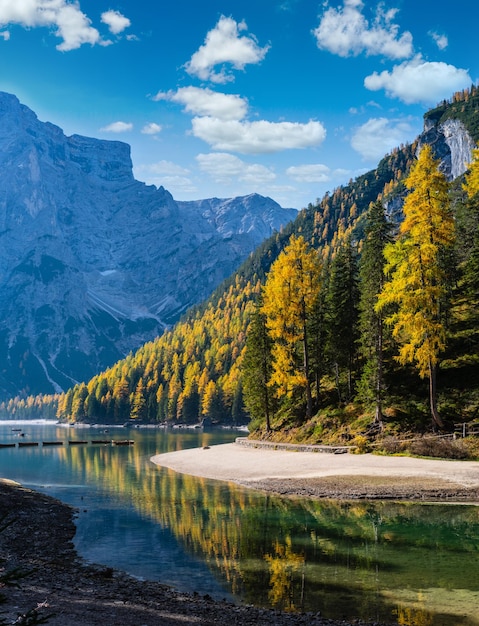 Autumn peaceful alpine lake Braies or Pragser Wildsee FanesSennesPrags national park South Tyrol Dolomites Alps Italy Europe Picturesque traveling seasonal and nature beauty concept scene