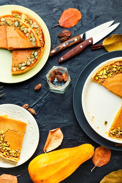 Autumn pumpkin pie on a plate