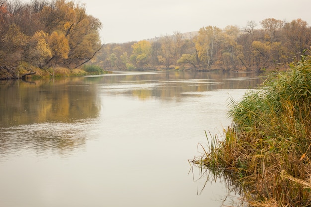 Autumn river, landscape, cloudy weather in autumn