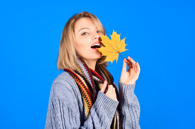 Autumn sexy woman with maple leaves autumn mood sensual woman with autumn leaf yellow maple leaf