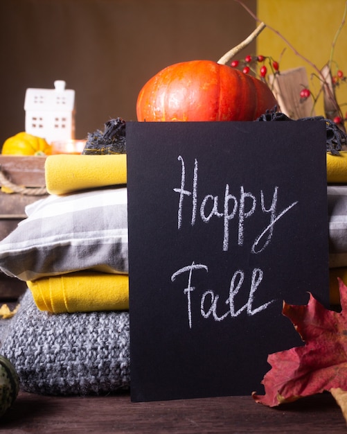 Autumn still life with pumpkins and candles