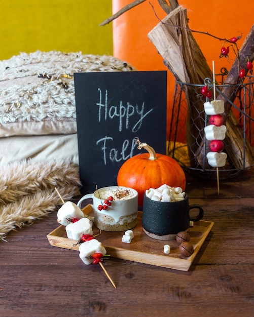 Autumn still life with pumpkins and plaids