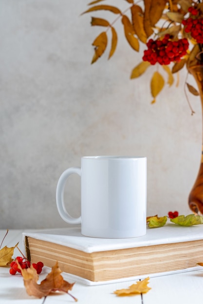 Autumn still life with single white cap, mockup