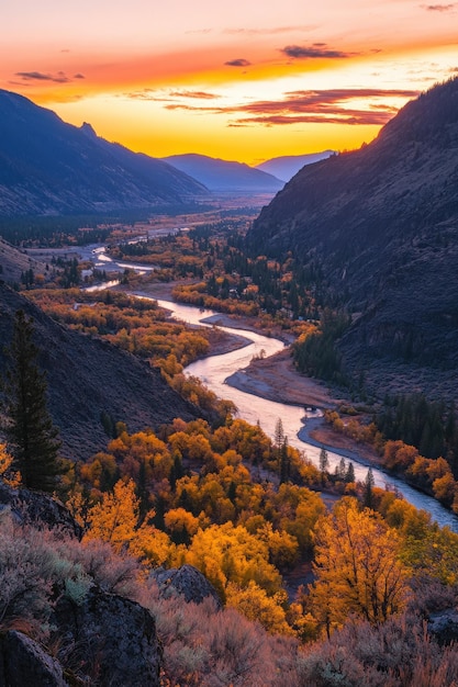 Photo autumn sunset over a winding river in a mountainous landscape