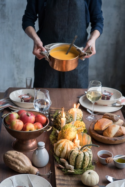 Autumn table setting with pumpkins