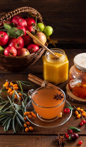 Autumn tea with berries and honey