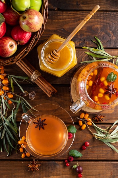 Autumn tea with berries and honey